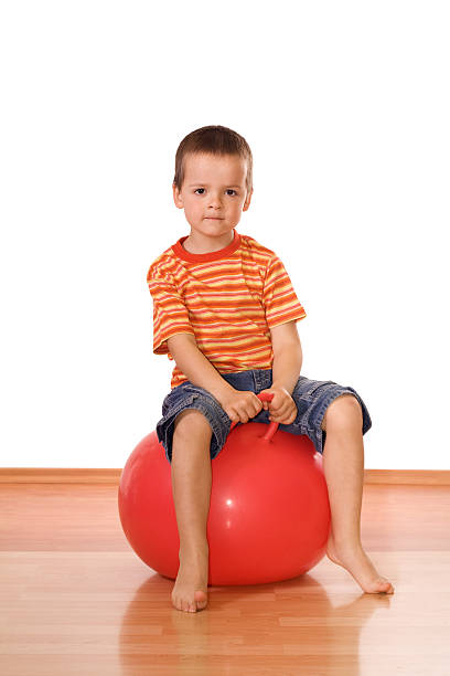 istock Serious boy with gymnastic ball 146002851
