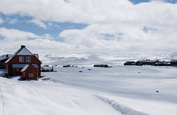 istock Norwegian mountains view with red house 146003050