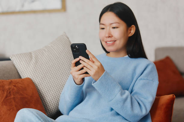 istock Woman paying online on mobile 1460031702