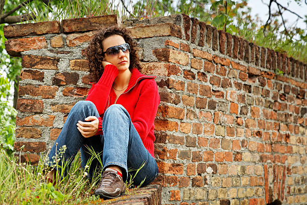 thinking young woman stock photo