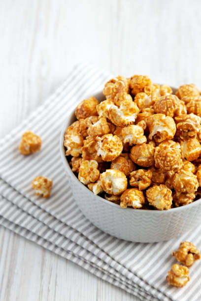 istock Homemade Caramel Popcorn in a gray Bowl, side view. 1460038265