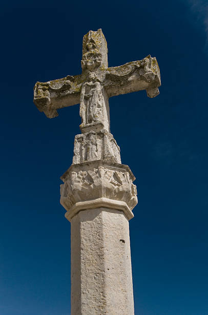istock Stone baroque cross in blue sky 146003845