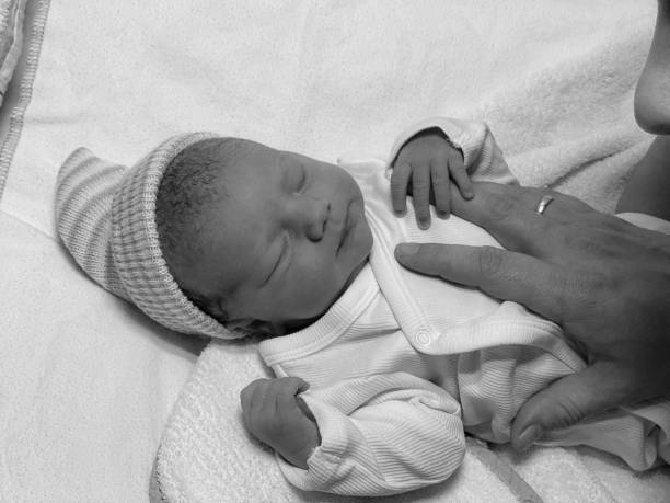 Happy family, young couple with cute baby girl