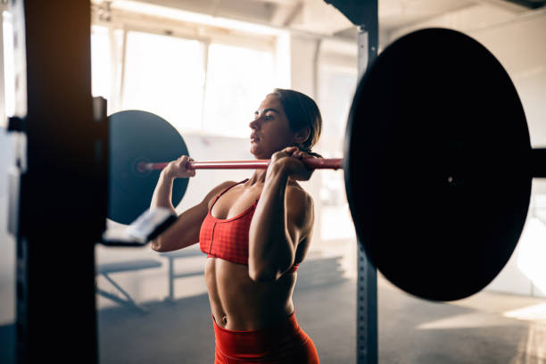 istock Female bodybuilder exercise in the modern gym 1460041932
