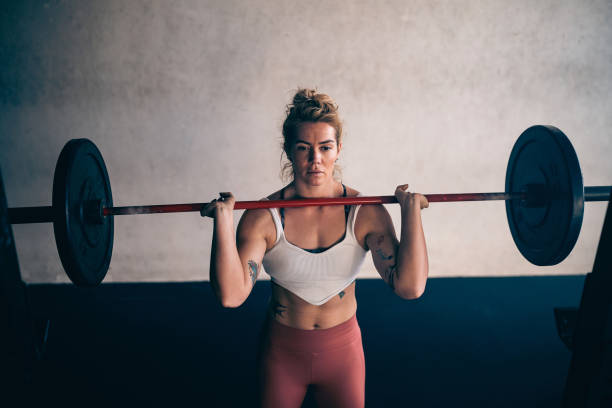 istock Caucasian female bodybuilder exercise in the modern gym 1460042605