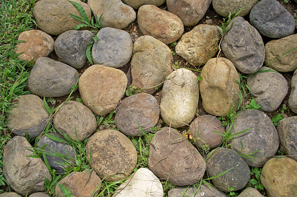 Rocks on grass stock photo