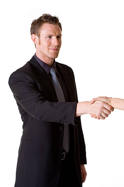 istock caucasian man in business suit making a hand shake 146004523