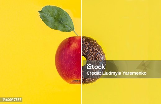 istock Collage of donut with chocolate glaze and red apple on the yellow background. Copy space. 1460047557