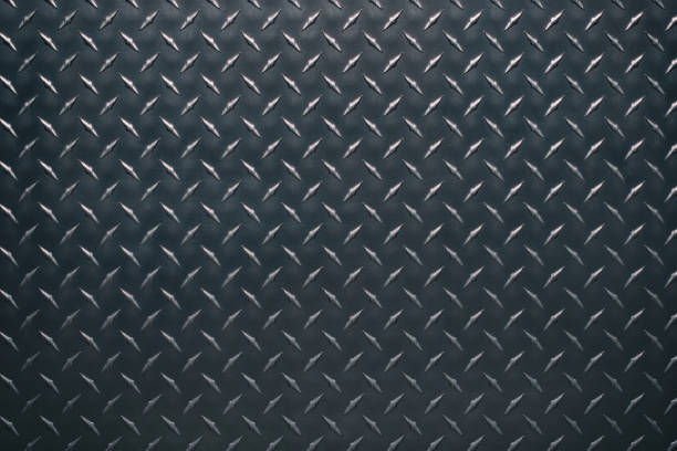istock black metal plate with corrugated texture. steel sheet as a background. 1460054545