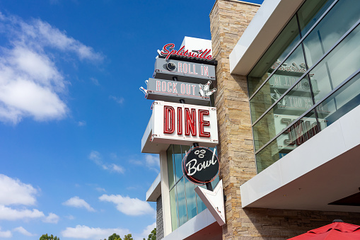 Anaheim, CA, USA – November 1, 2022: Bowling alley and restaurant Splitsville luxury lanes neon building sign in Anaheim, California.
