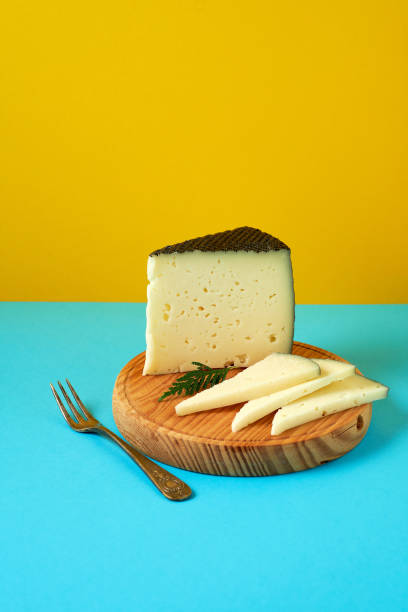 istock Semi-cured cheese with colorful background 1460055162