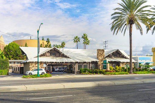 Anaheim, CA, USA – November 2, 2022: Street view of Alpine Inn Motel on Katella Ave in Anaheim, California.