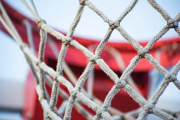 A closeup shot of a basketball net.