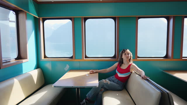 Portrait of woman traveling by ferry in Norway
