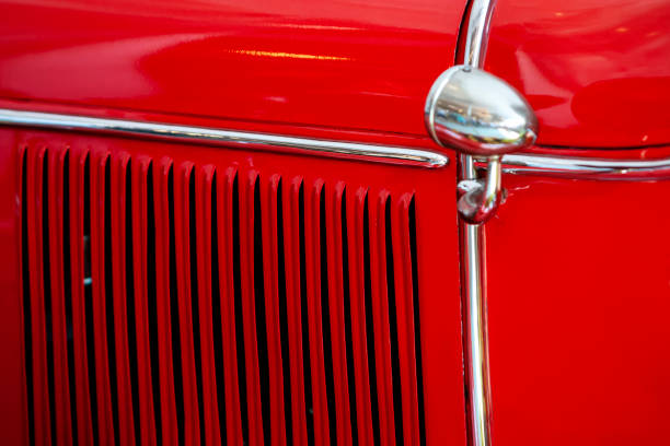 Westlake, TX, USA - October 17, 2015: Front details and grille of a red 1956 Ford Thunderbird Convertible classic car.