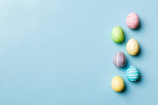 istock holiday preparation Multi colors Easter eggs on colored background . Pastel color Easter eggs. holiday concept with copy space 1460063870