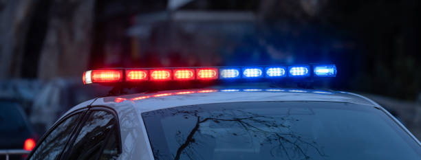 istock Police car with flashing lights on 1460067905