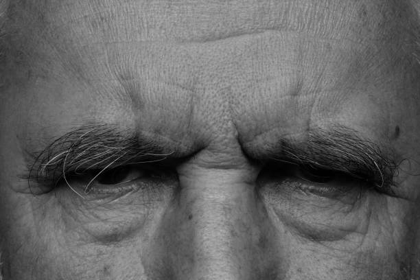 istock Eye views of an elderly man in black and white. 1460069054