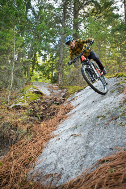 istock Riding down a Rock Slab on a Mountain Bike Ride 1460079183