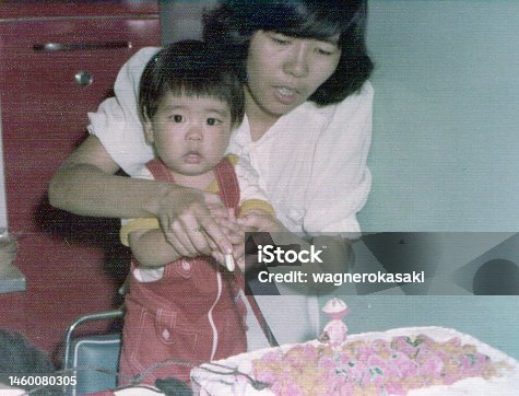 istock Young mother with her baby son celebrating his first birthday 1460080305