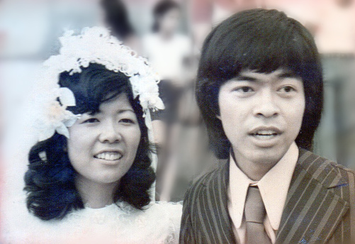 Portrait of newly wed young couple. This is a digitized old family picture