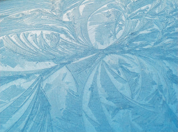 Frost shapes on a car; close-up.