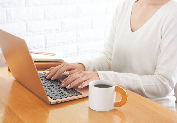 istock woman working on a laptop 1460092931