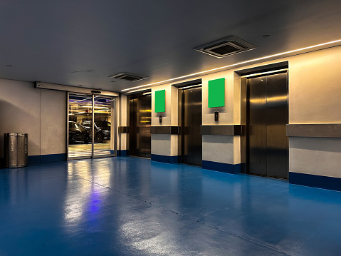 Elevators to access the car park with chroma surfaces for communication with users