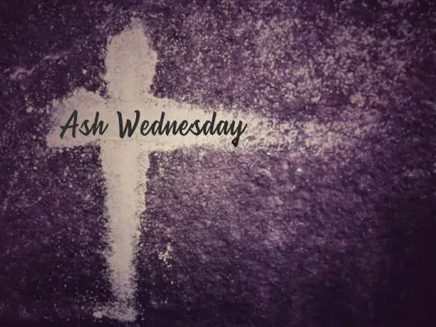 Lent Season, Holy Week, Ash Wednesday, Palm Sunday and Good Friday concepts. Ash Wednesday text in purple vintage background.