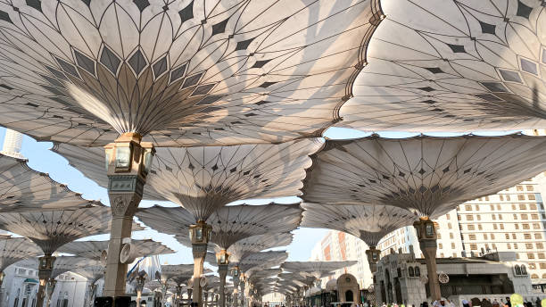 Nabawi Mosque The umbrella of Nabawi Mosque in December 2022 al masjid an nabawi stock pictures, royalty-free photos & images