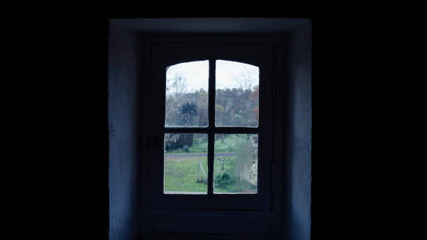 istock Small French window dark view indoors 1460100520