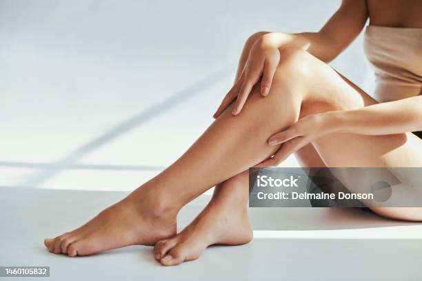 Woman Legs And Beauty In Studio For Skin Grooming And Hygiene Treatment Against Grey A Background Girl Leg And Model Relax After Skincare Cosmetics And Luxury Pamper And Self Care While Isolated Stock Photo - Download Image Now