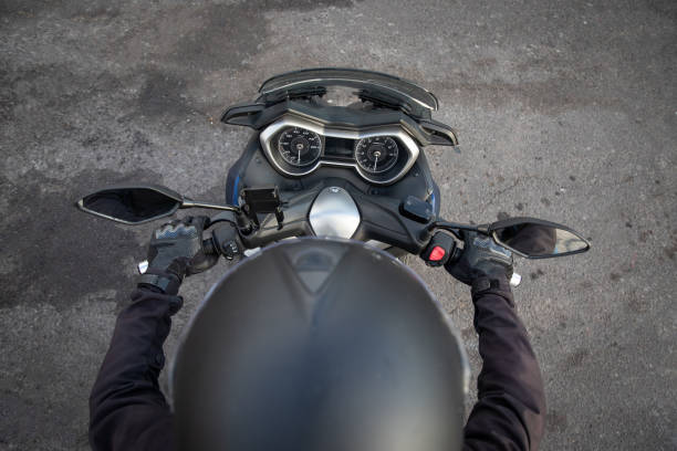 istock Top view of a biker riding his motorcycle, photo with copy space. 1460109700
