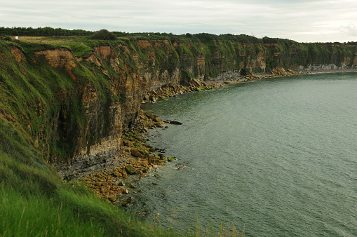 Famous Landscape At Pointe Du Hoc Place Of WW 2 In Normandy France On An Overcast Summer Day