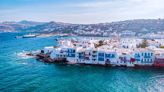 Mykonos Greece, colorful streets of the old town of Mykonos, Traditional narrow street with blue doors and white walls, Mykonos town Greece