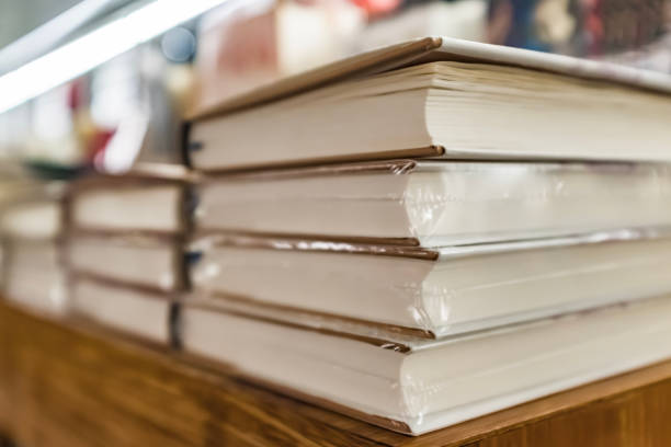istock Side view of a row of books, macro 1460123295