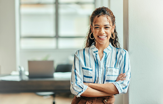 Expert, success and portrait of woman with arms crossed for corporate, executive and professional work. Happy, business and expert employee with an office smile, arms folded and vision for an agency