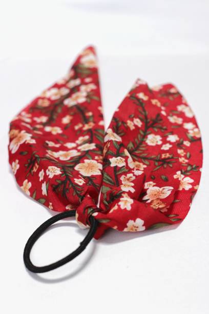 istock vintage hair tie, floral, red isolated on white background. selective focus. 1460128313