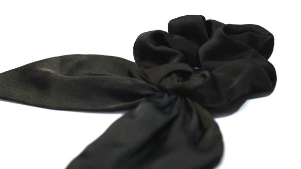 istock Bunny ears scrunchie hair tie satin material isolated white background. selective focus. 1460128552