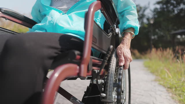 Senior woman using wheelchair