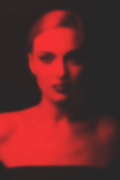 istock Abstract blurred and noisy woman portrait silhouette 1460152158