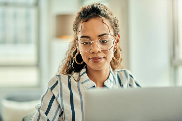 istock Accountant woman and working on laptop for strategy, brainstorming and problem solving in office. Professional accounting girl thinking in corporate workplace with focus and concentration. 1460158923