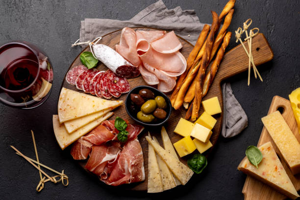 istock Antipasto board with various meat and cheese snacks 1460162186