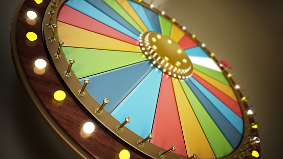 Multi-colored prize wheel detail with depth of field effect.