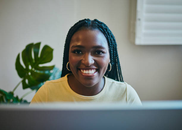 istock Working, computer and black woman with email management success, mission and confident smile. Copywriting, blog writer and office worker, person or employee portrait on pc for creative inspiration 1460165673