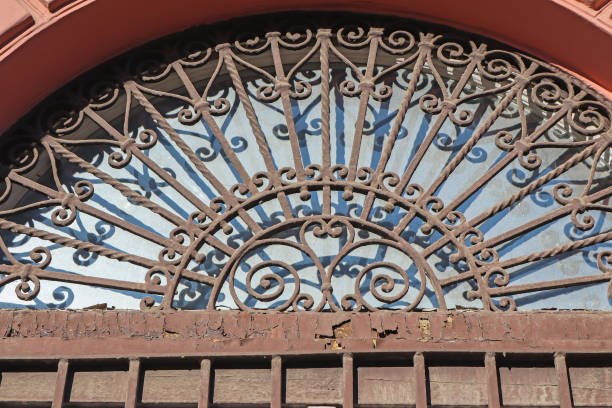 istock Wrought iron protector on a window of a house 1460166727