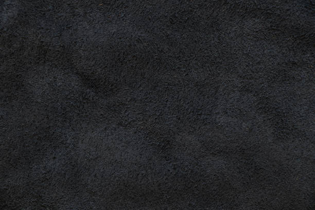 dark gray natural suede as a background close-up