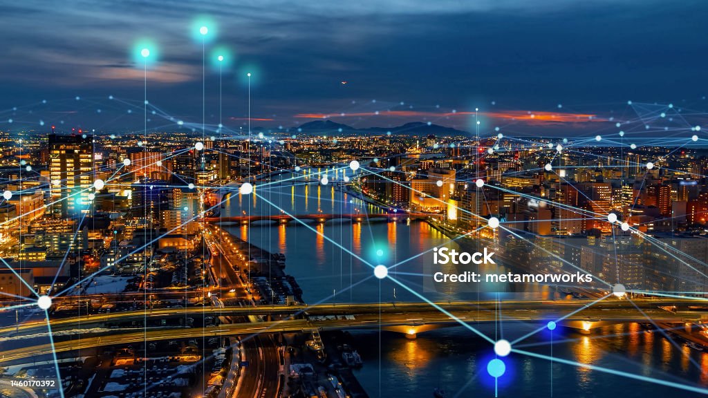 Modern cityscape and communication network concept. Telecommunication. IoT (Internet of Things). ICT (Information communication Technology). 5G. Smart city. Digital transformation. City Stock Photo