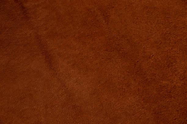 istock dark brown natural suede as a background close-up 1460170468