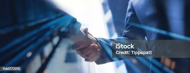 Businessmen Making Handshake With Partner Greeting Dealing Merger And Acquisition Business Cooperation Concept For Business Finance And Investment Background Teamwork And Successful Business Stock Photo - Download Image Now